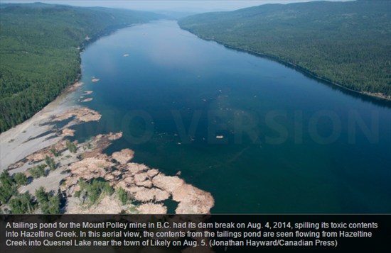 Tailings pond, Mount Polley mine, dam break, spilling toxic contents (Jonathan Hayward/Canadian Press)